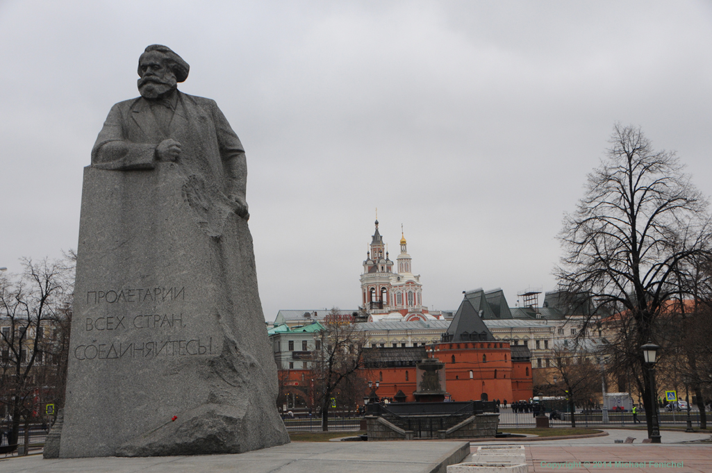 [Karl Marx and Revolution Square - Day]