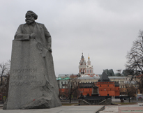 [Marx and Revolution Square - Day]