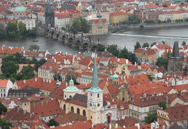 [Charles Bridge (Karlův most) - View from St. Vitus Belltower. Click on the photo to fly in closer, to the tower on the right on this end of the bridge, with a lovely view of Charles Bridge and Mala Strana.]